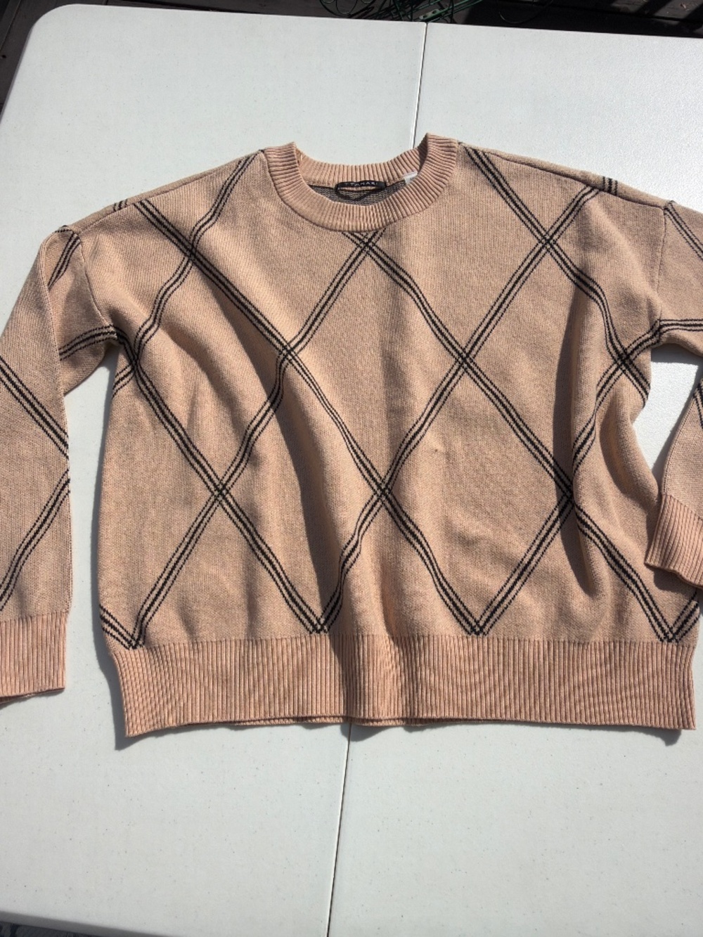 T Tahari sweater for women size small. Tan and black color